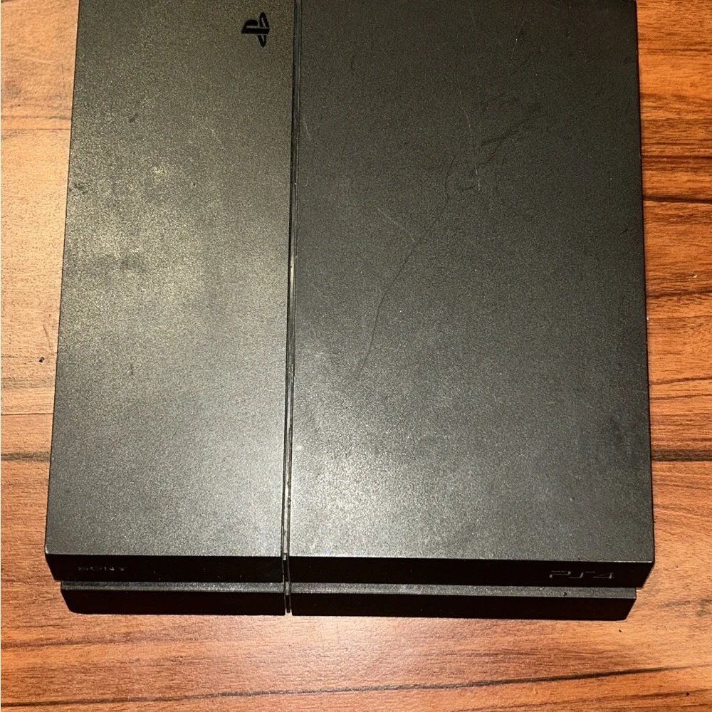 PS4 500GB Console Bundle - 4 Games Included (No Controller) – Works Great